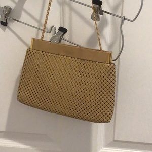 Metal clutch bag w/gold chain tan excellence condition. $10